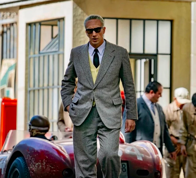 Enzo Ferrari (Adam Driver, far left) in "Ferrari." (Neon)