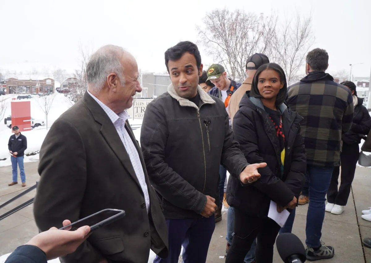 Steve King, Vivek Ramaswamy, and Candace Owens speak to press outside the National Czech-Slovak Museum & Library in Cedar Rapids, Iowa, on Jan. 11, 2024. (Nathan Worcester/The Epoch Times)