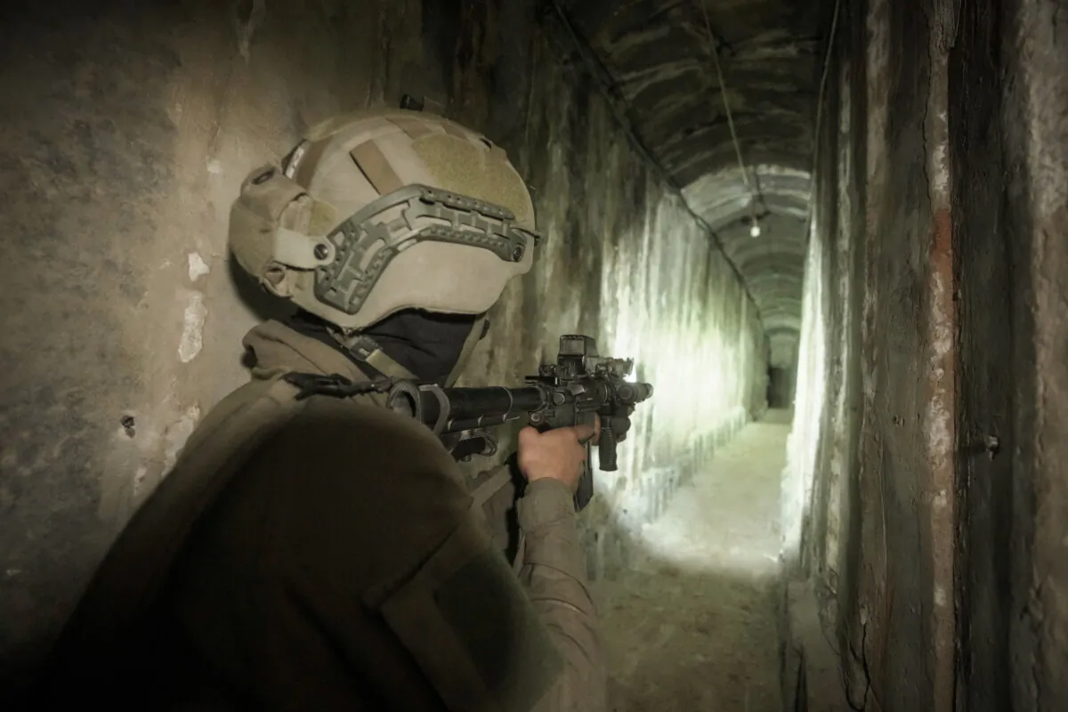 Israeli soldiers show the media an underground tunnel found underneath Shifa Hospital in Gaza City, Gaza, on Nov. 22, 2023. (Victor R. Caivano/AP Photo,, File)
