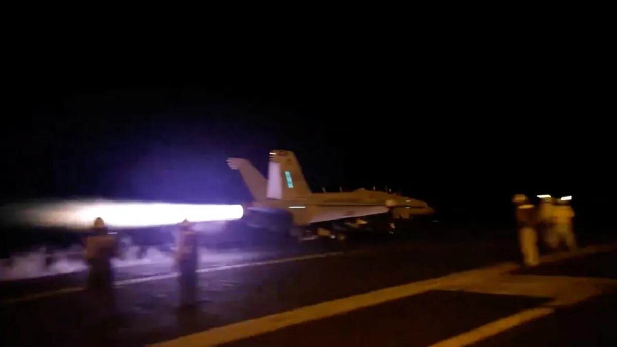 An aircraft takes off to join the U.S.-led coalition to conduct air strikes against military targets in Yemen, aimed at the Iran-backed Houthi militia that has been targeting international shipping in the Red Sea, from an undisclosed location, in this screengrab from a handout video released on Jan. 12, 2024. (U.S. Central Command via X/Handout via Reuters)