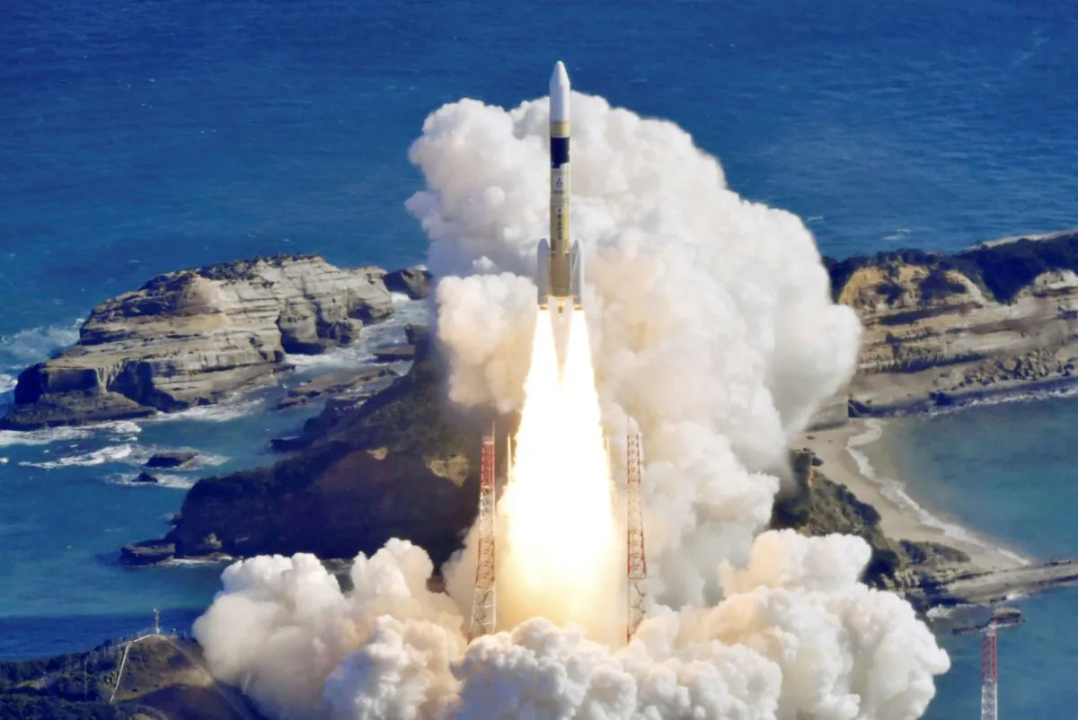 An H2A rocket is lifted from the launch pad at Tanegashima Space Center in Kagoshima, southern Japan, on Jan. 12, 2024. (Kyodo News via AP)