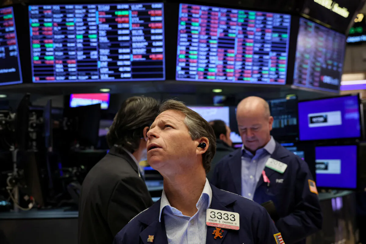 Traders work on the floor at the New York Stock Exchange (NYSE) in New York City on Jan. 9, 2024. (Brendan McDermid/Reuters)