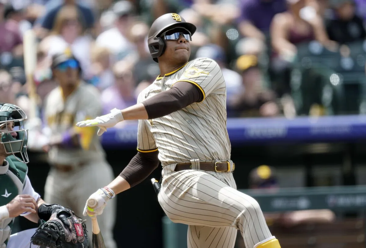 San Diego Padres' Juan Soto follows the flight of his two-run home run against Colorado Rockies starting pitcher Kyle Freeland in the third inning of a baseball game in Denver on Aug. 2, 2023. (David Zalubowski/AP Photo)