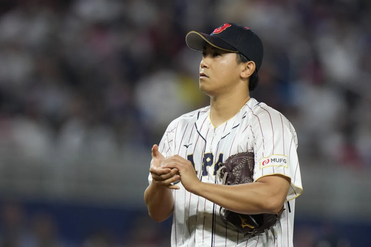 Japan pitcher Shota Imanaga (21) prepares to throw during the first inning of a World Baseball Classic championship game against the United States in Miami on March 21, 2023. (Wilfredo Lee/AP Photo)