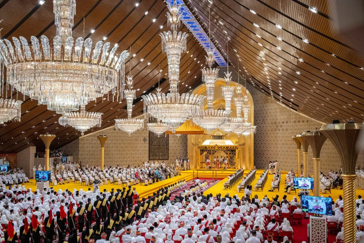 The royal powdering ceremony for Brunei's Prince Abdul Mateen's, (C), at Istana Nurul Iman, ahead of his wedding with Anisha Rosnah, in Bandar Seri Begawan, Brunei, in this picture taken on Jan. 10, 2024. (Brunei's Information Department via AP)