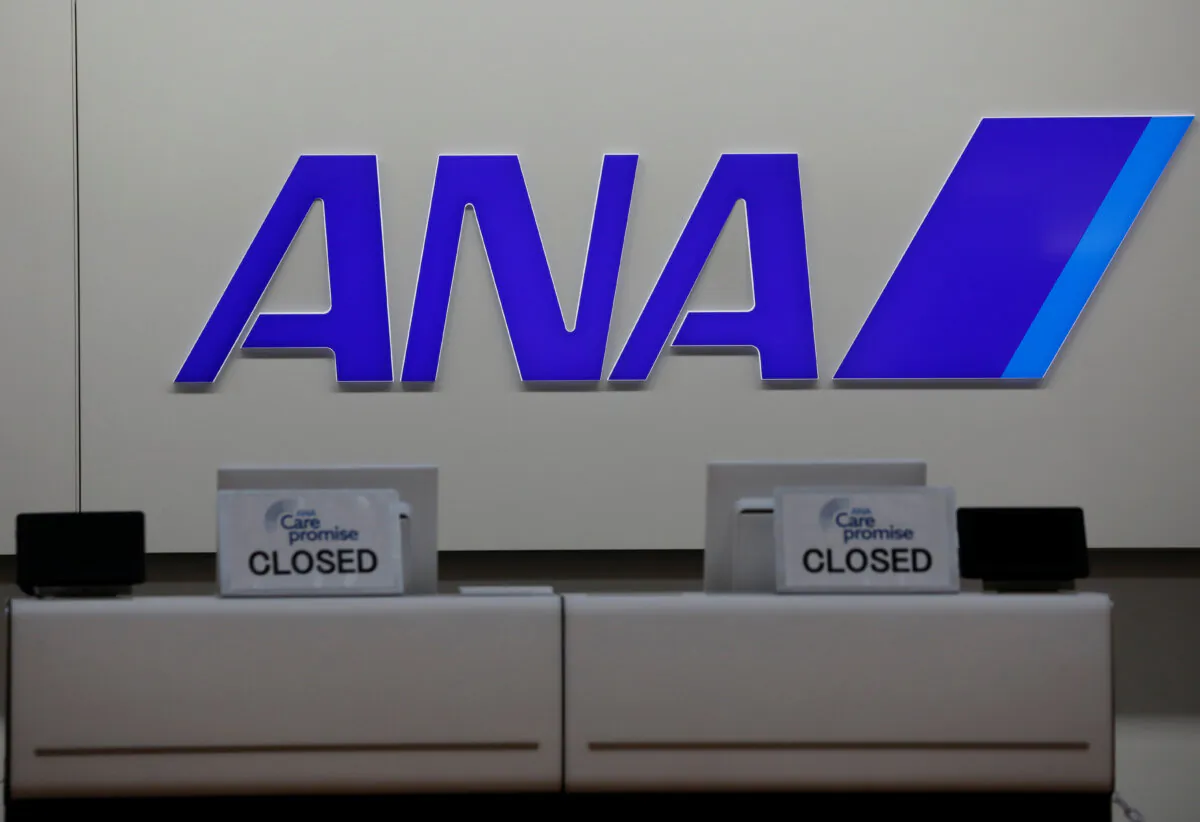 The logo of All Nippon Airways (ANA) is seen on its counter amid the coronavirus disease (COVID-19) outbreak, at a terminal of the Tokyo International Airport, commonly known as Haneda Airport, in Tokyo, Japan, on Oct. 27, 2020. (Kim Kyung-Hoon/Reuters, File photo)
