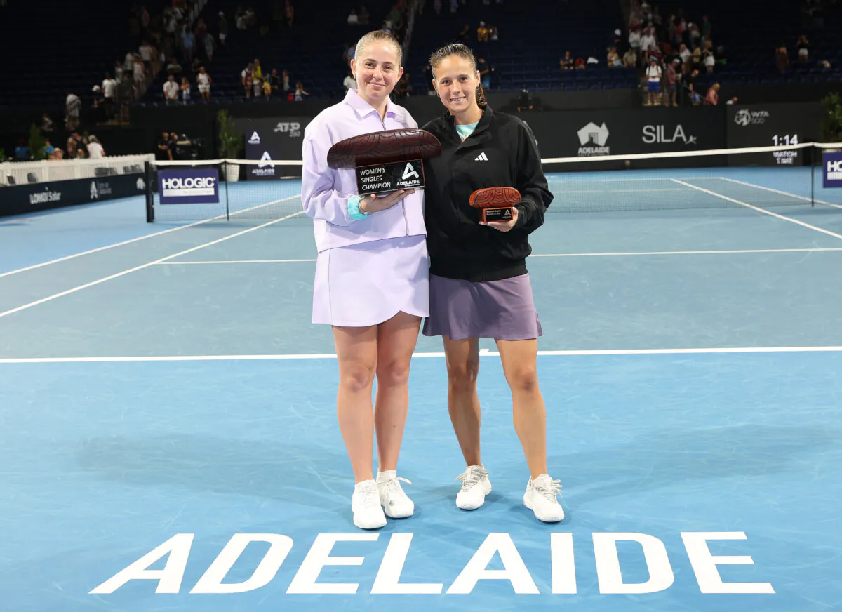 Ladies singles finals winner and runner-up Jelena Ostapenko of Latvia and Daria Kasatkina with their trophies after presentations in the 2024 Adelaide International at Memorial Drive, in Adelaide, Australia, on Jan. 13, 2024. (Sarah Reed/Getty Images)