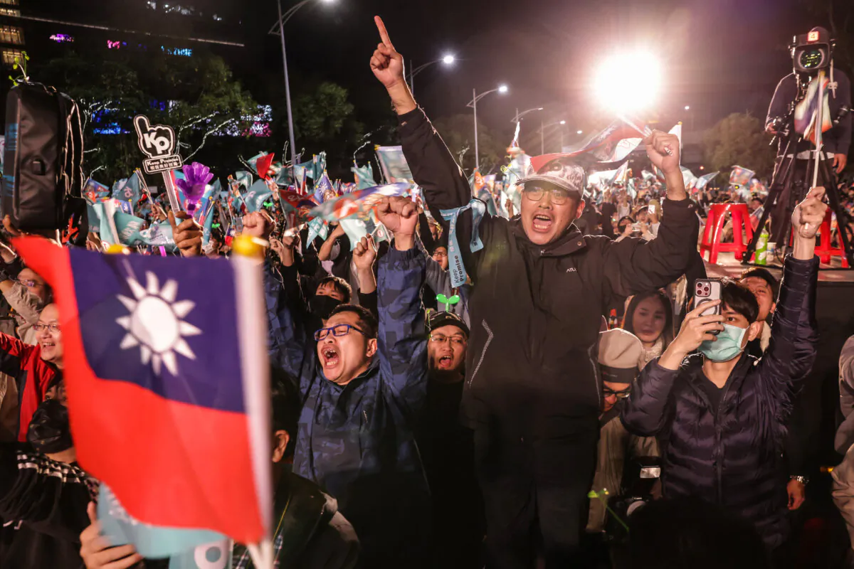 Supporters of Taiwan People's Party (TPP) presidential candidate Ko Wen-je wait for the results of the presidential election at the TPP headquarters in Xinzhuang, New Taipei City, Taiwan, on Jan. 13, 2024. (I-Hwa Cheng/AFP via Getty Images)