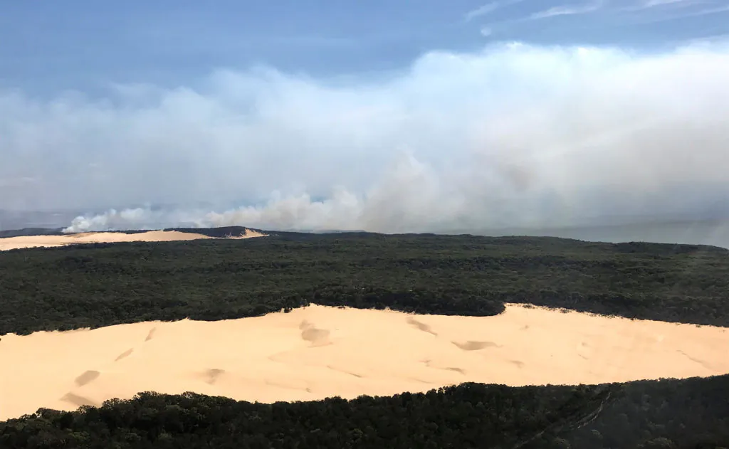 In this handout image provided by Queensland Fire and Emergency Services (QFES), bushfires continue to burn on Fraser Island, Australia, on Nov. 30, 2020. (Queensland Fire and Emergency Services (QFES) via Getty Images)