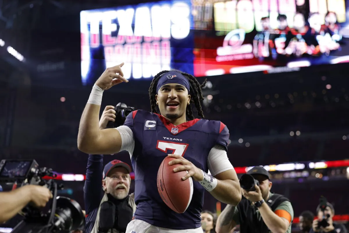 C.J. Stroud (7) of the Houston Texans celebrates after defeating the Cleveland Browns in the AFC Wild Card Playoffs at NRG Stadium in Houston on Jan. 13, 2024. (Carmen Mandato/Getty Images)