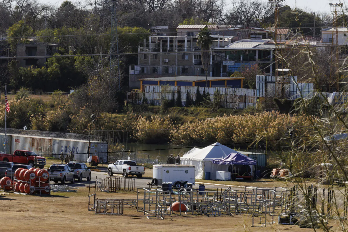 Texas Department of Public Safety officers work inside the fenced-off Shelby Park in Eagle Pass, Texas, on Jan. 11, 2024. (Sam Owens/The San Antonio Express-News via AP)