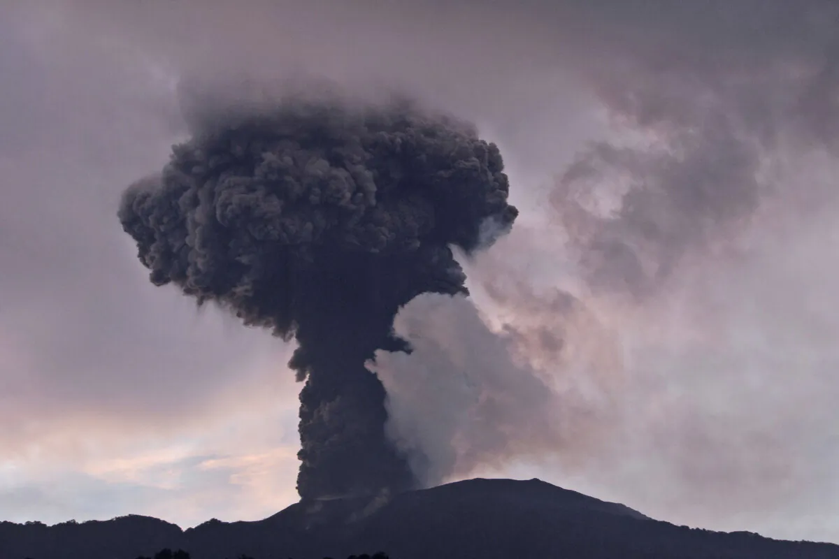 Mount Marapi spews volcanic material from its crater during an eruption in Agam, West Sumatra, Indonesia, on Jan. 14, 2024. (Givo Alputra/AP Photo)