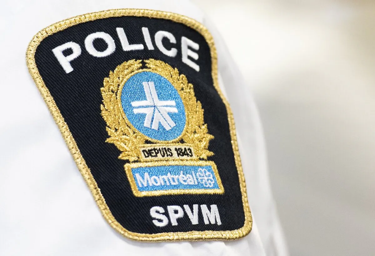 A Montreal police badge is shown during a news conference in Montreal, on Aug. 4, 2022. (The Canadian Press/Graham Hughes)