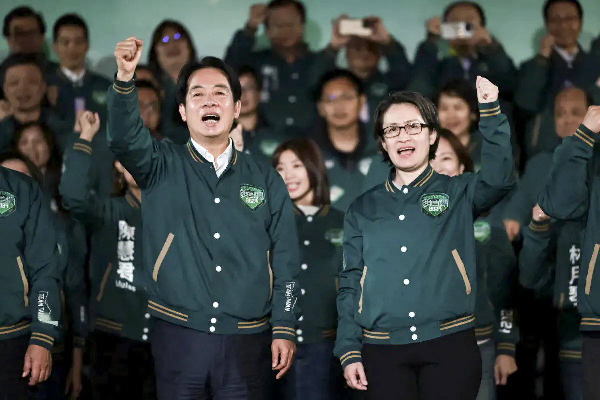 Taiwan's President-elect Lai Ching-te (L) gestures beside his running mate Hsiao Bi-khim during a rally outside the headquarters of the Democratic Progressive Party (DPP) in Taipei on Jan. 13, 2024. (Yasuyoshi Chiba/AFP via Getty Images)