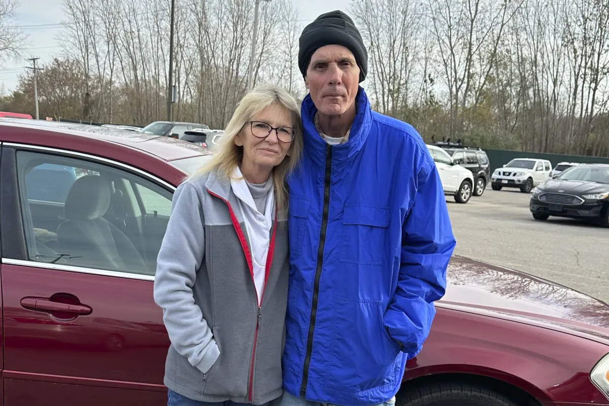 Louis Wright, right, stands with his sister, Darlene Hall, after his release from a Michigan prison on November 2023. (Daniella Mizhericher/Cooley Law School Innocence Project via AP)