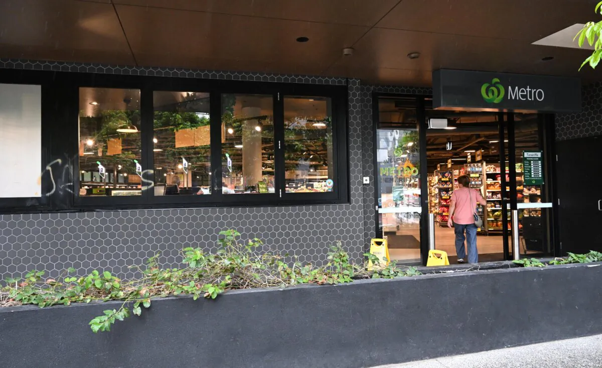 A Woolworths Metro store has been tagged with profanities and pro-Australia Day graffiti In Brisbane, Australia, on Jan. 15, 2024. (AAP Image/Darren England)