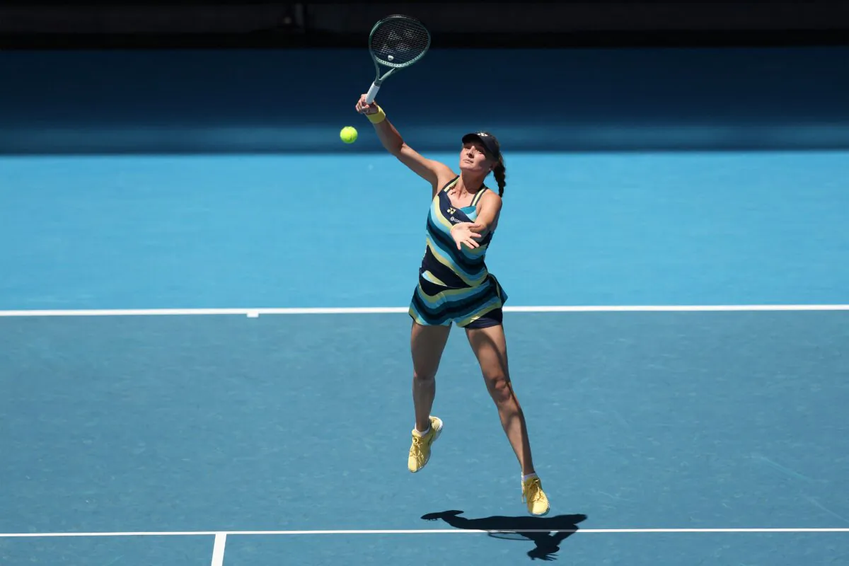 Ukraine's Dayana Yastremska hits a return against Czech Republic's Marketa Vondrousova during their women's singles match on day two of the Australian Open tennis tournament in Melbourne, Australia, on Jan. 15, 2024. (Martin Keep/AFP via Getty Images)