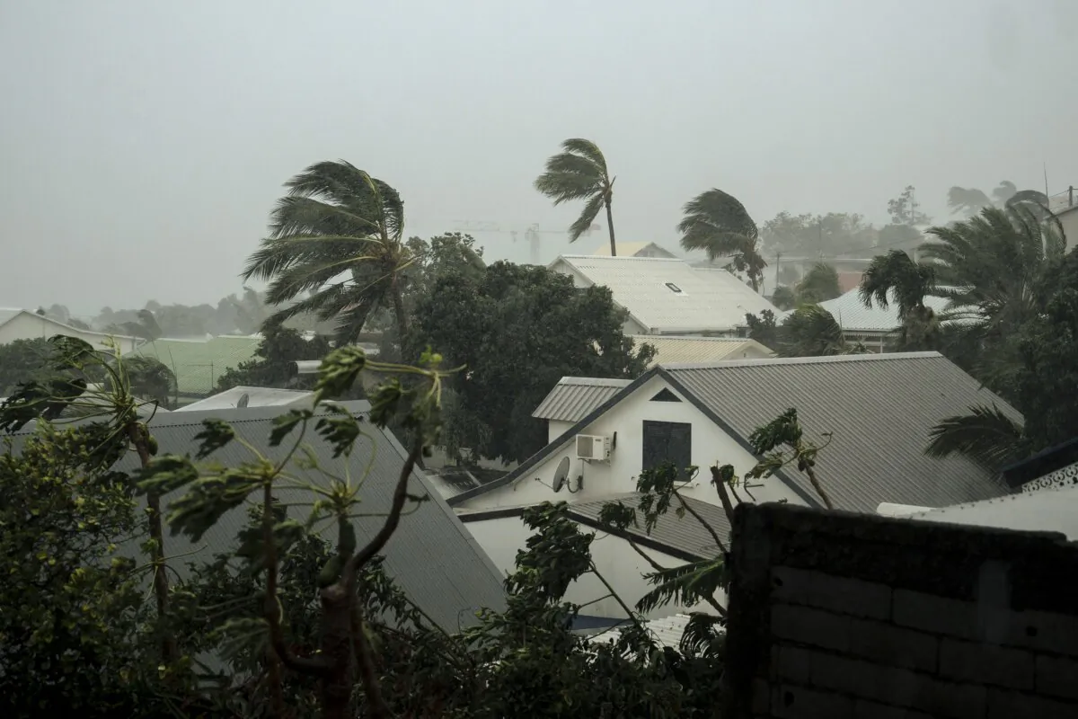 Strong winds blow in the town of La Plaine Saint-Paul on the French Indian Ocean island of Reunion on Jan. 15, 2024. (Lewis Joly/AP Photo)