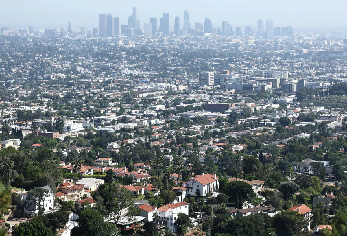 Homes stand in front of the downtown skyline in Los Angeles on Aug. 30, 2023. (Mario Tama/Getty Images)