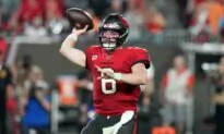 Mayfield Throws for 337 Yards and 3 TDs to Lead Buccaneers to 32–9 NFC Wild-Card Rout of Eagles