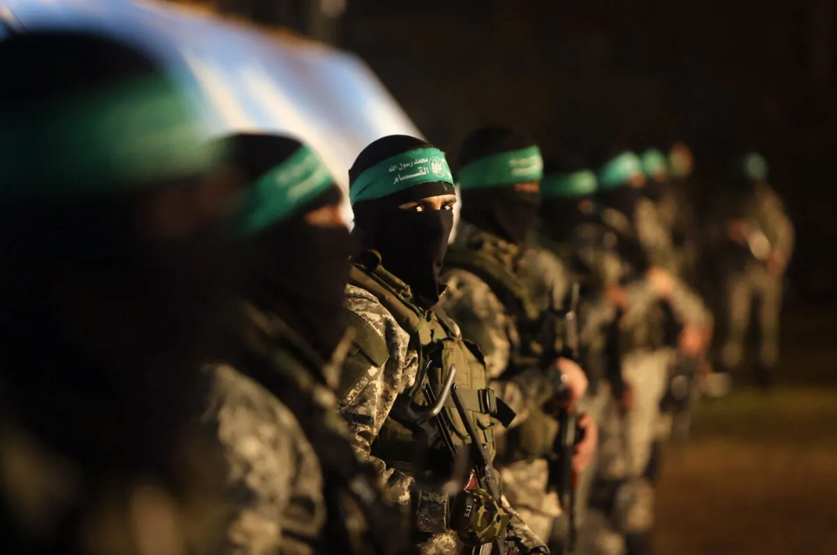 Members of the Ezzedine al-Qassam Brigades, the armed wing of the Hamas terrorist group, take part in a gathering in Gaza City on Jan. 31, 2016. (Mahmud Hams/AFP via Getty Images)
