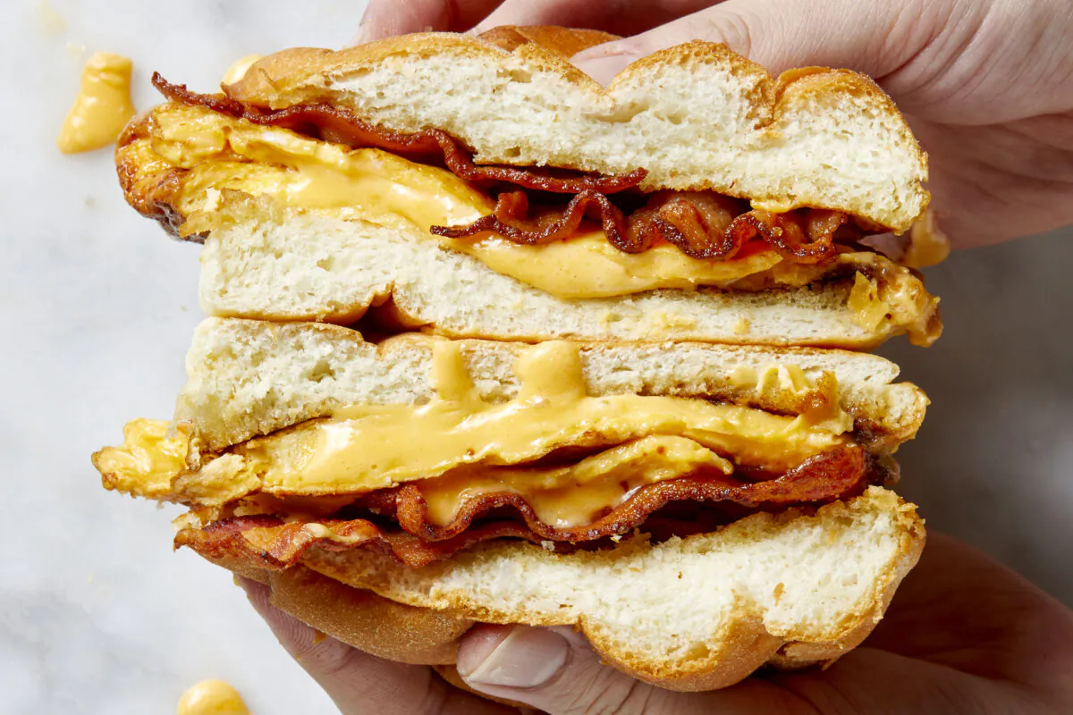 New Yorkers' breakfast of choice features crispy bacon, gooey cheese, and creamy eggs smushed between a kaiser roll. (Alex Lepe/TNS)