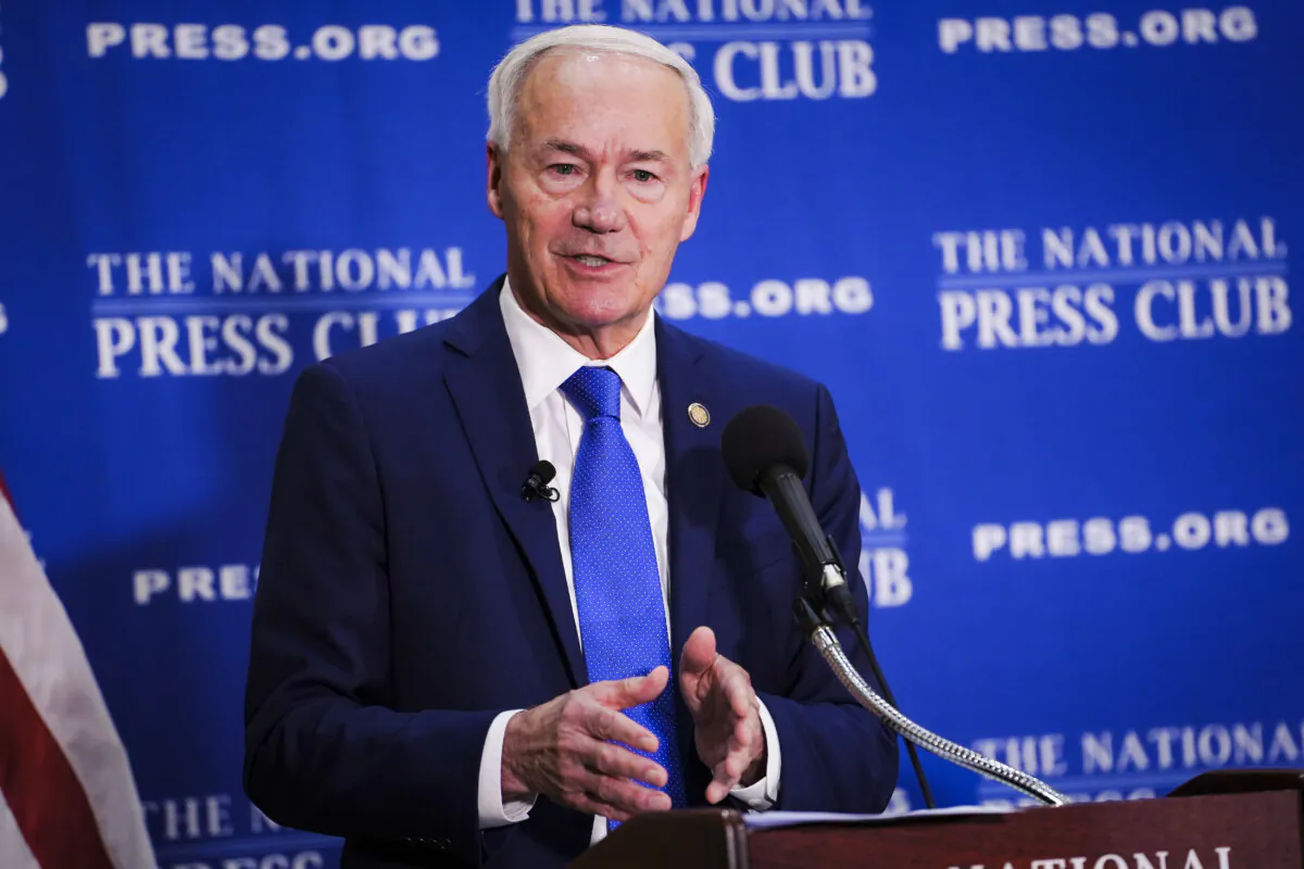 Republican presidential candidate and former Arkansas Gov. Asa Hutchinson announces the first plank of his presidential campaign's policy agenda at the National Press Club in Washington on July 17, 2023. (Madalina Vasiliu/The Epoch Times)