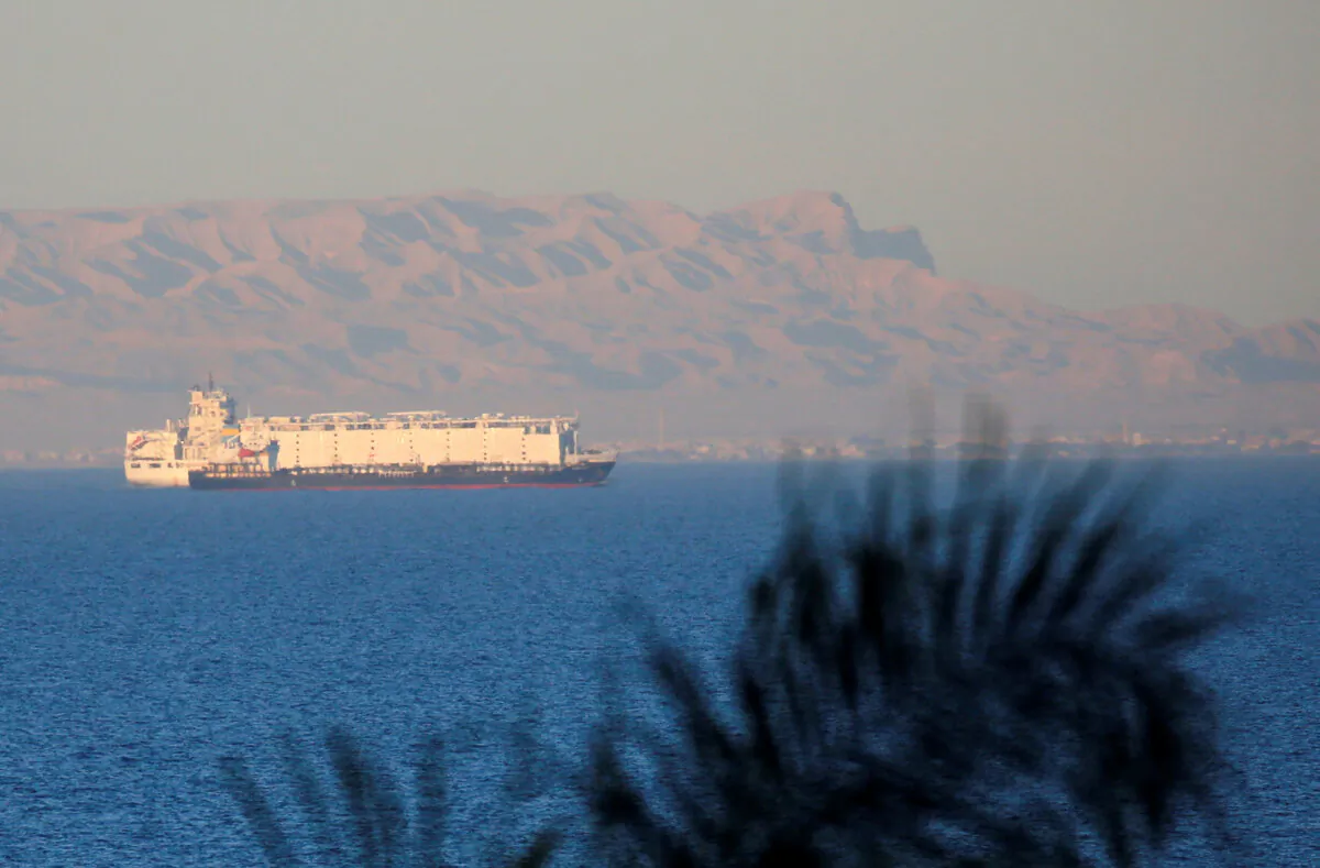 Container ships sail across the Gulf of Suez toward the Red Sea before entering the Suez Canal, in El Ain El Sokhna in Suez, east of Cairo, Egypt, on March 17, 2018. (Amr Abdallah Dalsh/Reuters)