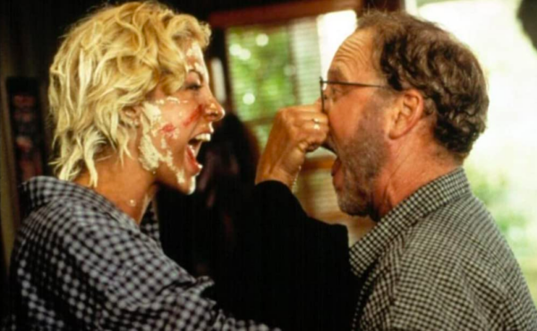 man and woman have food fight in KRIPPENDORF'S TRIBE