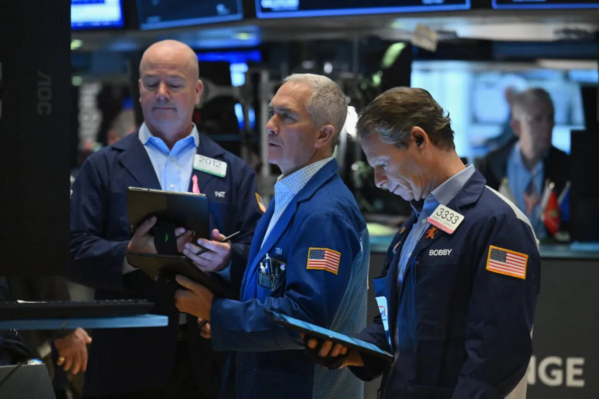 Traders work on the floor of the New York Stock Exchange (NYSE) during morning trading in New York City on Jan. 11, 2024. (Angela Weiss/AFP via Getty Images)