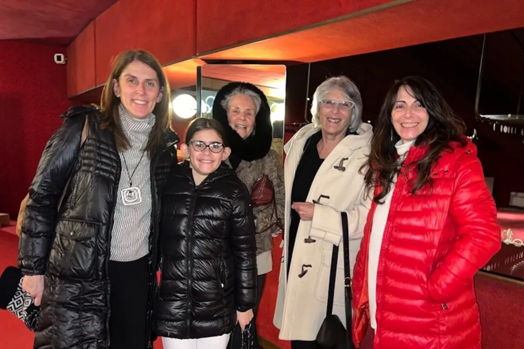 Laura Conti (1st R) and her relatives and friends enjoyed Shen Yun Performing Arts at the Teatro Regio Torino on Jan. 12, 2024. (Shi Ping/The Epoch Times)