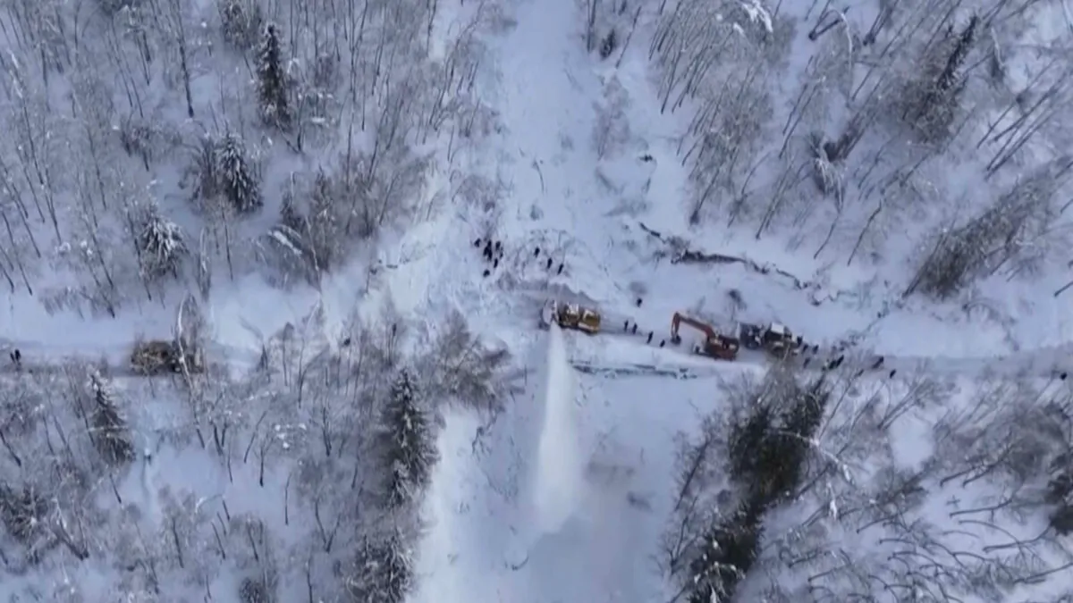 A road blocked by snow in Altay Prefecture in northwestern China's Xinjiang Region on Jan. 16, 2024. (CCTV via AP)