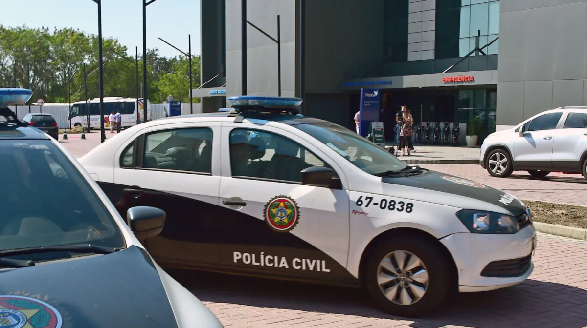 Police patrol cars in Barra da Tijuca, Rio de Janeiro, Brazil, on Aug. 17, 2016. (Tasso Marcelo/AFP via Getty Images)