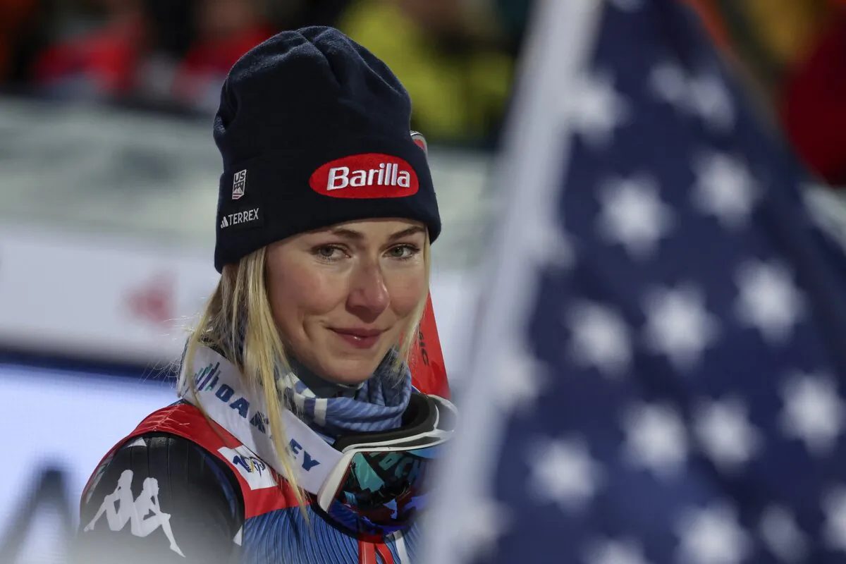 United States' Mikaela Shiffrin stands on podium after winning an alpine ski in women's World Cup slalom in Flachau, Austria, on Jan. 16, 2024. (Marco Trovati/AP Photo)
