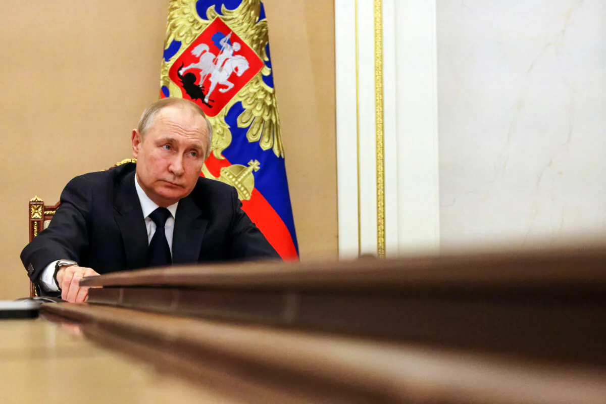 Russian President Vladimir Putin chairs a meeting via teleconference in Moscow on March 10, 2022. (Mikhail Klimentyev/Sputnik/AFP via Getty Images)