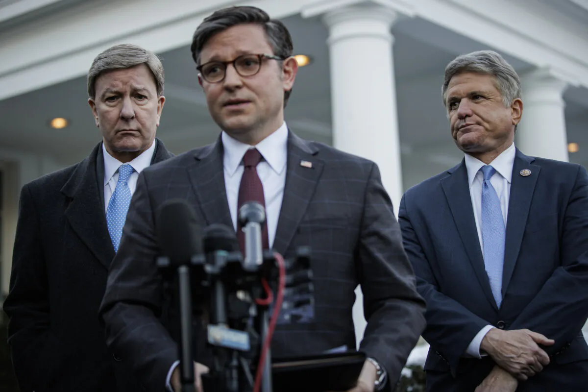 House Speaker Mike Johnson (R-La.), flanked by Mike Rogers (R-Ala.) (L) and Rep. Mike McCaul (R-Texas), makes a statement outside the West Wing of the White House on Jan. 17, 2024. (Samuel Corum/Getty Images)