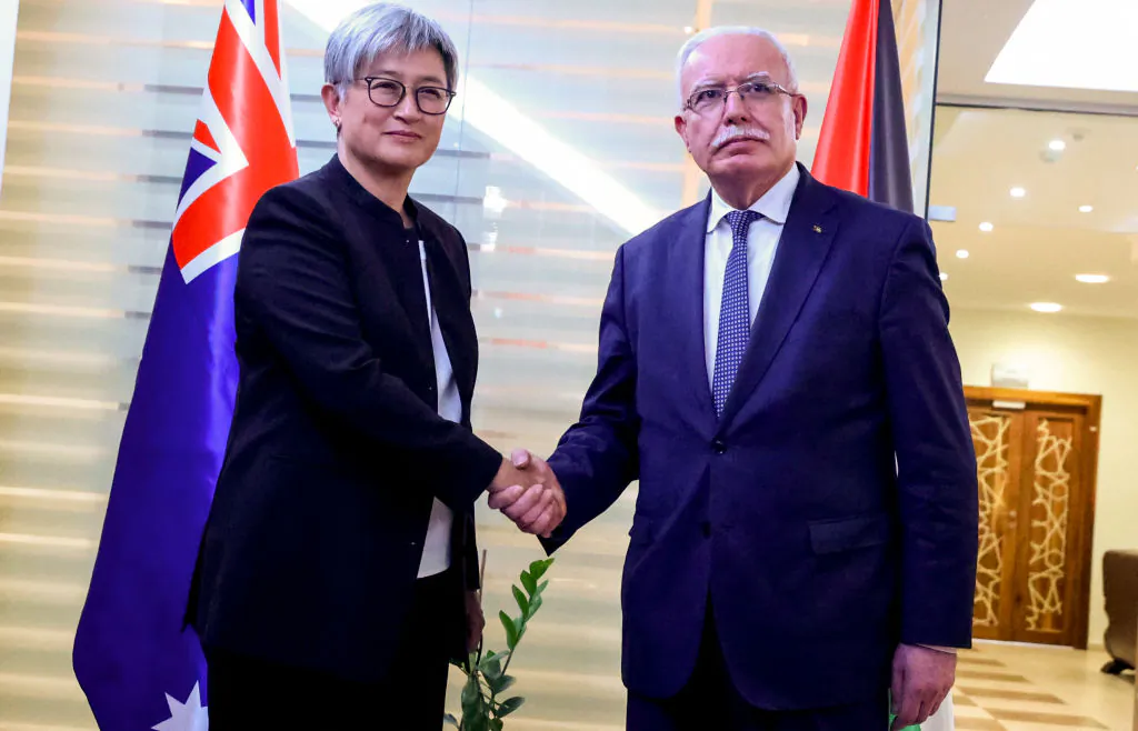 Palestinian Foreign Minister Riyad al-Maliki (R) receives Australian Foreign Minister Penny Wong (L), in Ramallah, in the occupied West Bank on Jan. 17, 2024. (Jaafar Ashtiyeh/AFP via Getty Images)