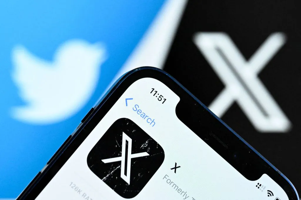 A photo taken on Nov. 17, 2023 shows the logo of US online social media and social networking service X (formerly Twitter) on a smartphone screen in Frankfurt am Main, western Germany. (Kirill Kudryavtsev/AFP via Getty Images)