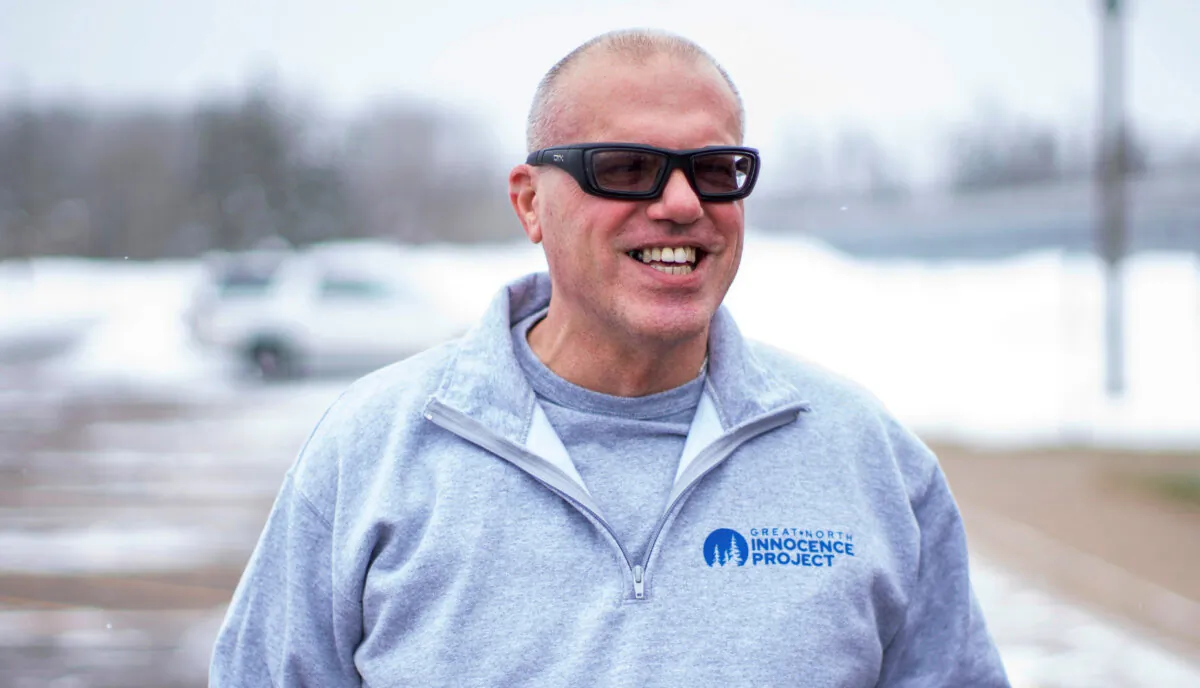 Thomas Rhodes smiling as he walks out of a Minnesota state prison in Moose Lake, Minn., on Jan. 13, 2023. (Fong Lee via AP)
