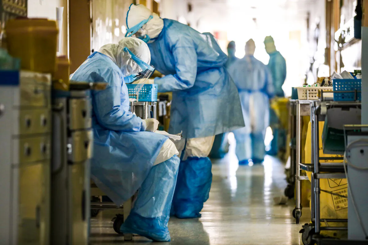 Medical staff members working at the isolation ward of the Wuhan Red Cross Hospital in Wuhan, Hubei Province, China, on Feb. 16, 2020. (AFP via Getty Images)