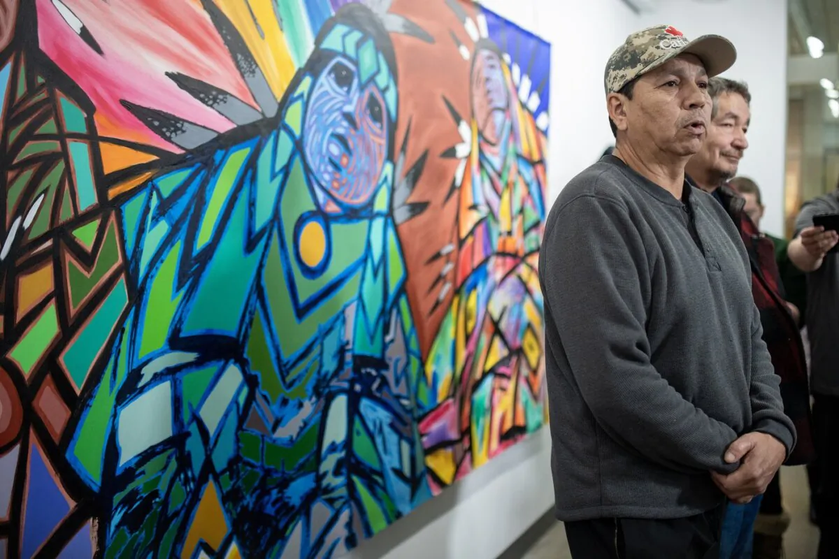 Darryl Burns (R), whose sister Gloria Burns was killed during the James Smith Cree Nation and Weldon, Sask., mass stabbings in 2022, and Stewart Head, whose brother was also killed, speak to media at the public coroner's inquest in Melfort, Sask., on Jan. 17, 2024. (The Canadian Press/Liam Richards)