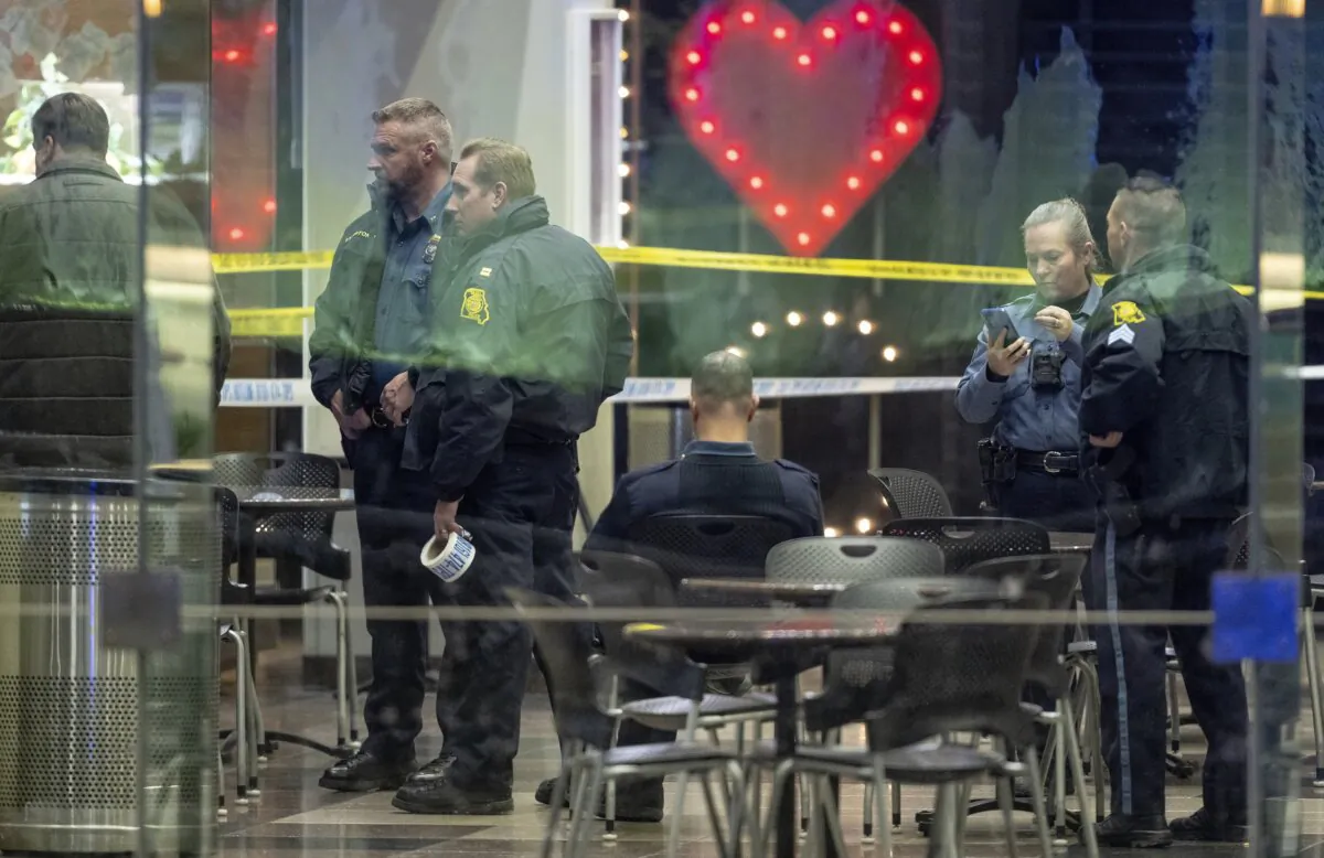 Police work the scene of a shooting at Crown Center in Kansas City, Mo., on Jan. 17, 2024. (Nick Wagner/The Kansas City Star via AP)