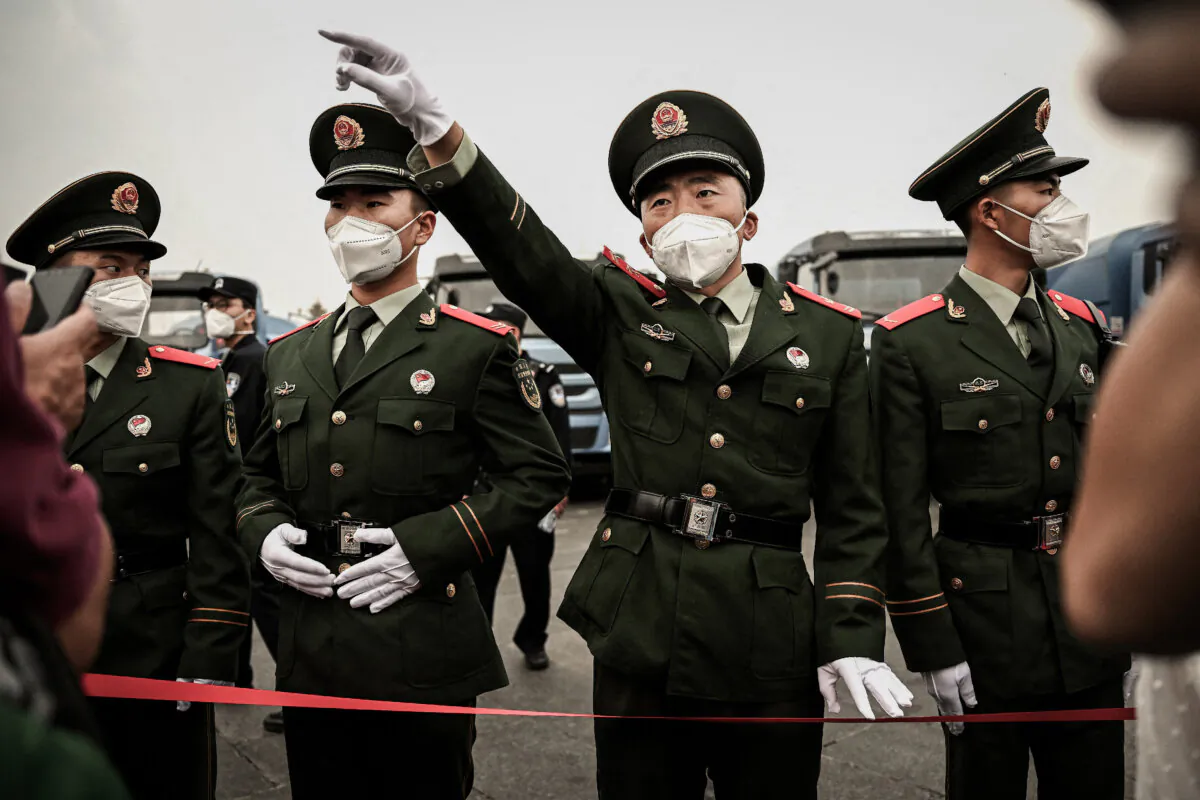 Soldiers at Tiananmen Square in Beijing on Oct. 1, 2022. (Noel Celis/AFP via Getty Images)