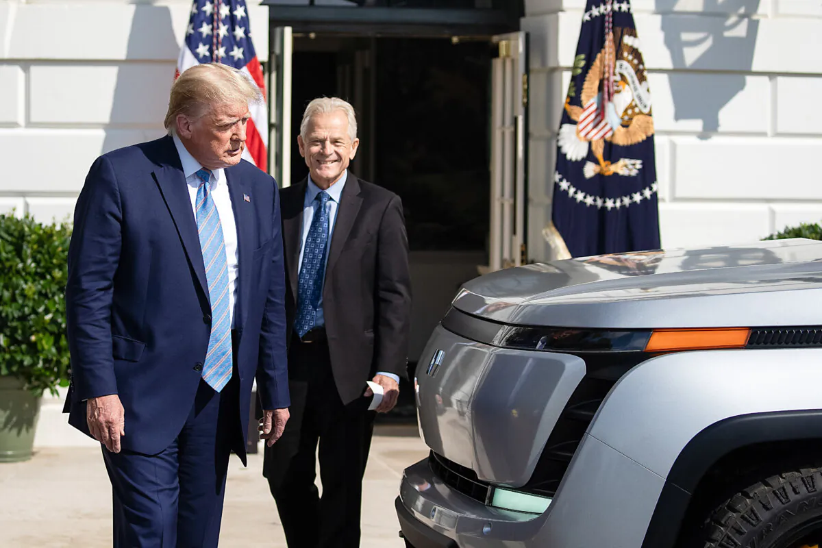President Donald Trump and White House trade adviser Peter Navarro check out the new Endurance all-electric pickup truck on the south lawn of the White House in Washington on Sept. 28, 2020. (Tasos Katopodis/Getty Images)