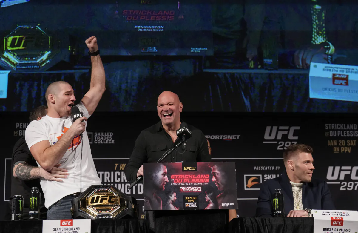 Sean Strickland, left, UFC middleweight champion and Dricus Du Plessis, right, hold a press conference ahead of UFC 297 in Toronto on Jan. 18, 2024. The pay-per-view card, the first in Toronto since UFC 231 in December 2018, features nine Canadians and two world title fights. (Nathan Denette/The Canadian Press)