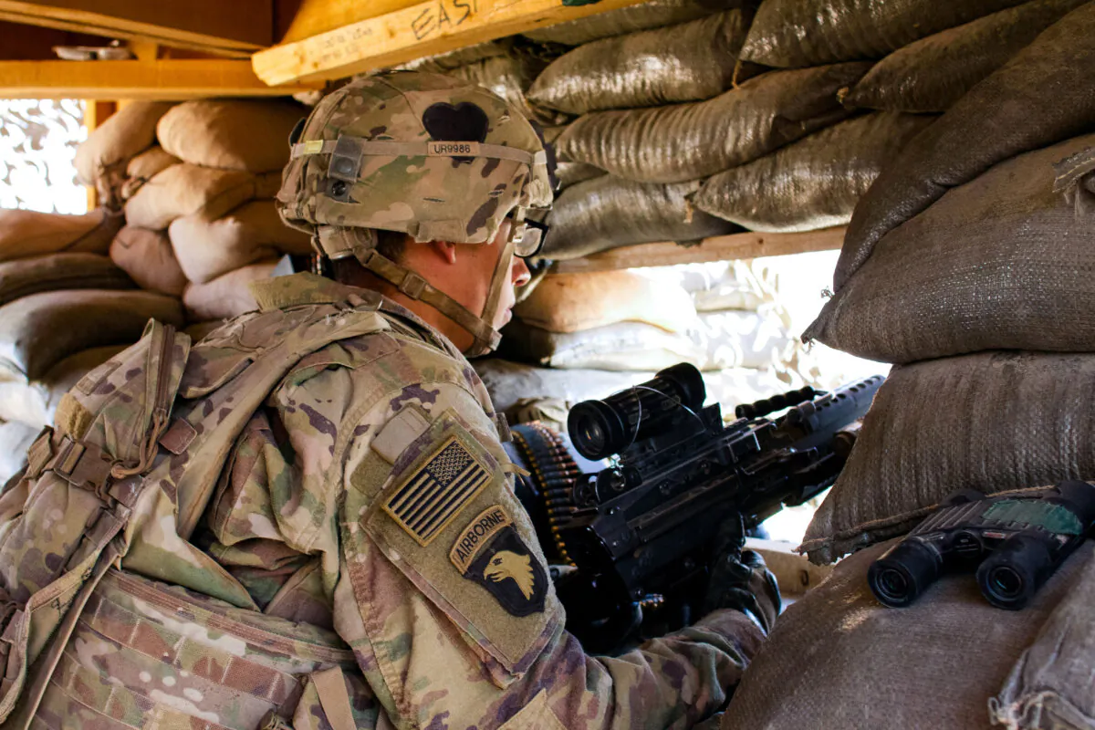 A U.S. Army soldier guards a position at Camp Swift, northern Iraq, on Sept. 8, 2016. (Susannah George/AP Photo)