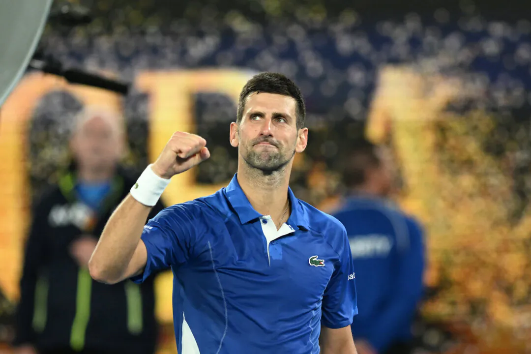 Novak Djokovic of Serbia celebrates his third-round win over Tomas Martin Etcheverry of Argentina on Day 6 of the 2024 Australian Open at Melbourne Park in Melbourne, Jan. 19, 2024. (AAP Image/James Ross)
