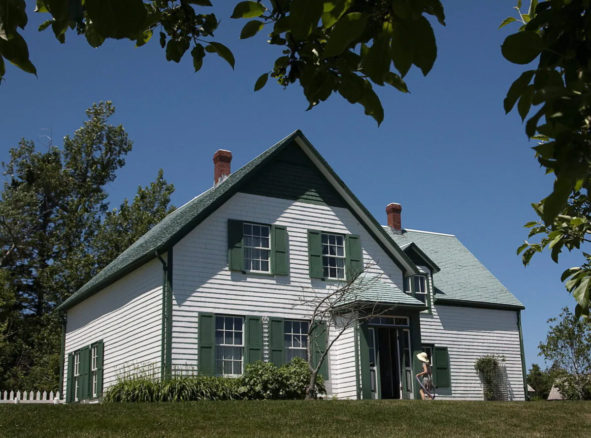 A young girl enters Green Gables House in Cavendish, Prince Edward Island, on July 3, 2011. (The Canadian Press/Andrew Vaughan)