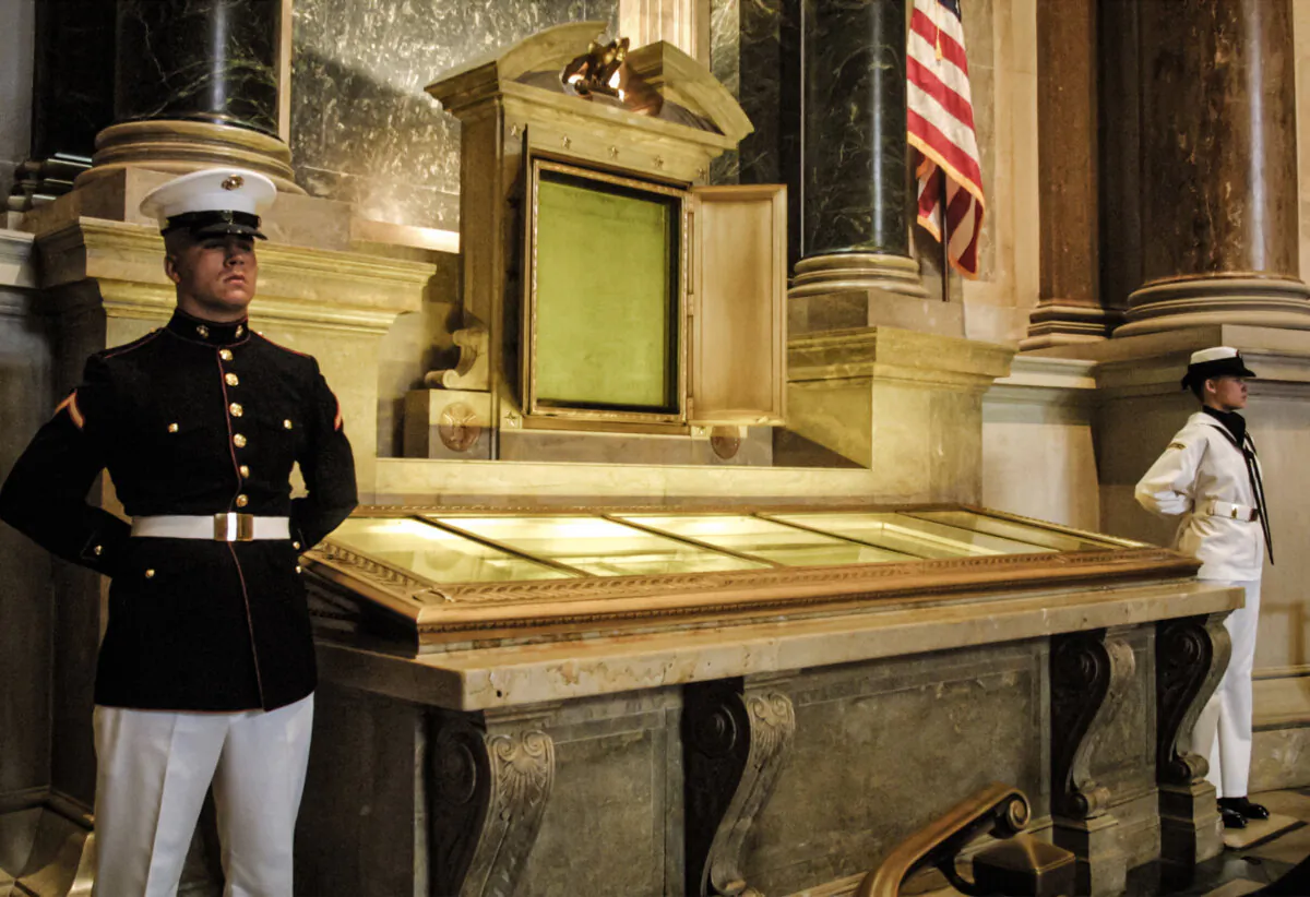 An honor guard stands next to the original copies of the Declaration of Independence, the Constitution, and the Bill of Rights at the National Archives in Washington, in a file photo. (Alex Wong/Getty Images)