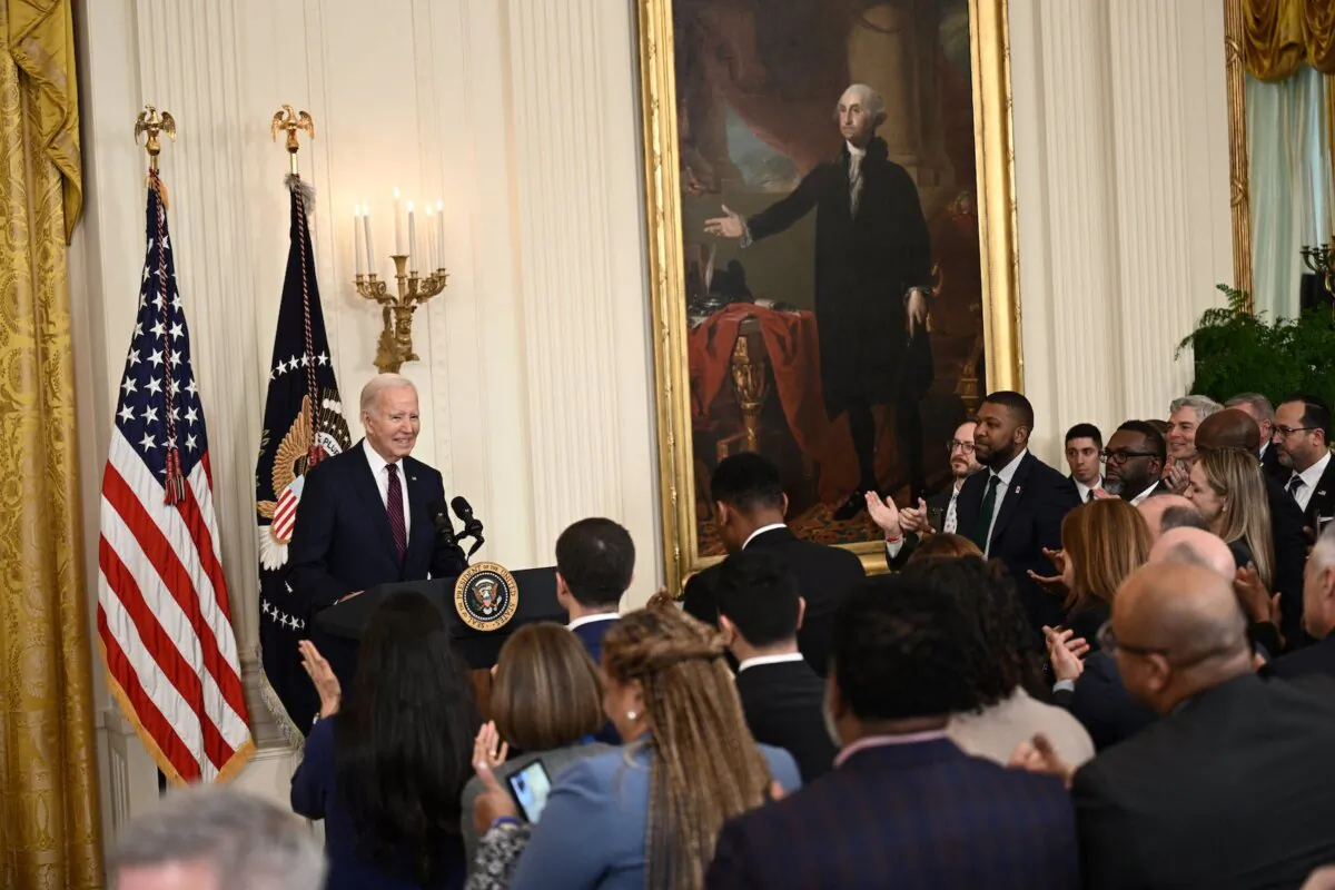 President Joe Biden arrives to address mayors attending the U.S. Conference of Mayors Winter Meeting in the East Room of the White House on Jan. 19, 2024. (Brendan Smialowski/AFP via Getty Images)